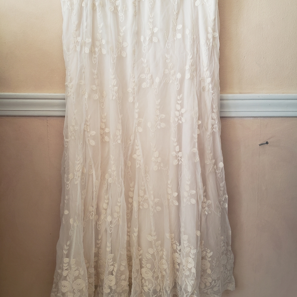 Long white skirt with lacy overlay